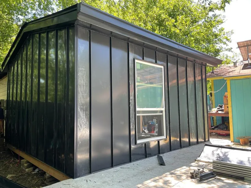 Black standing seam metal wall panels for Metal Roof Installation in Ormond Beach