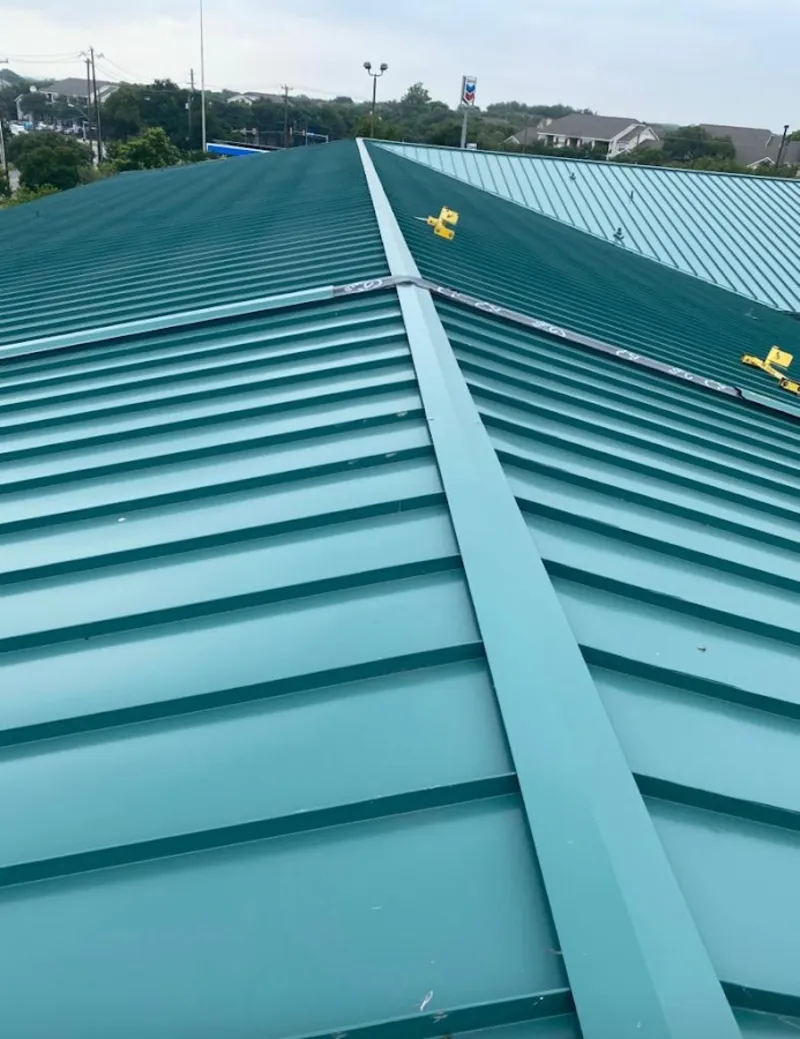 Green commercial metal roof ridge and valley for Metal Roof Repair in Ormond Beach